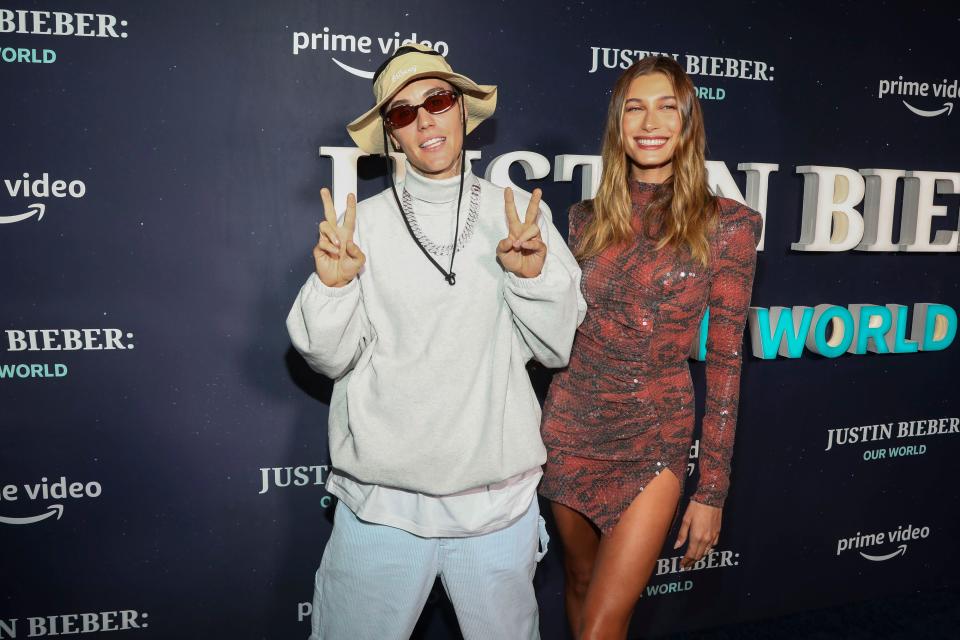 Justin Bieber, left, and wife Hailey Baldwin at Tuesday's premiere of "Justin Bieber: Our World" in New York.