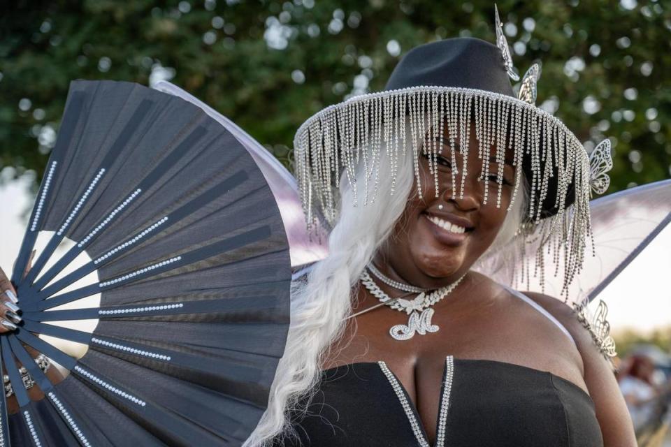 Veronica McDowall of Orlando shows off her butterfly inspired outfit outside Arrowhead Stadium on Sunday.