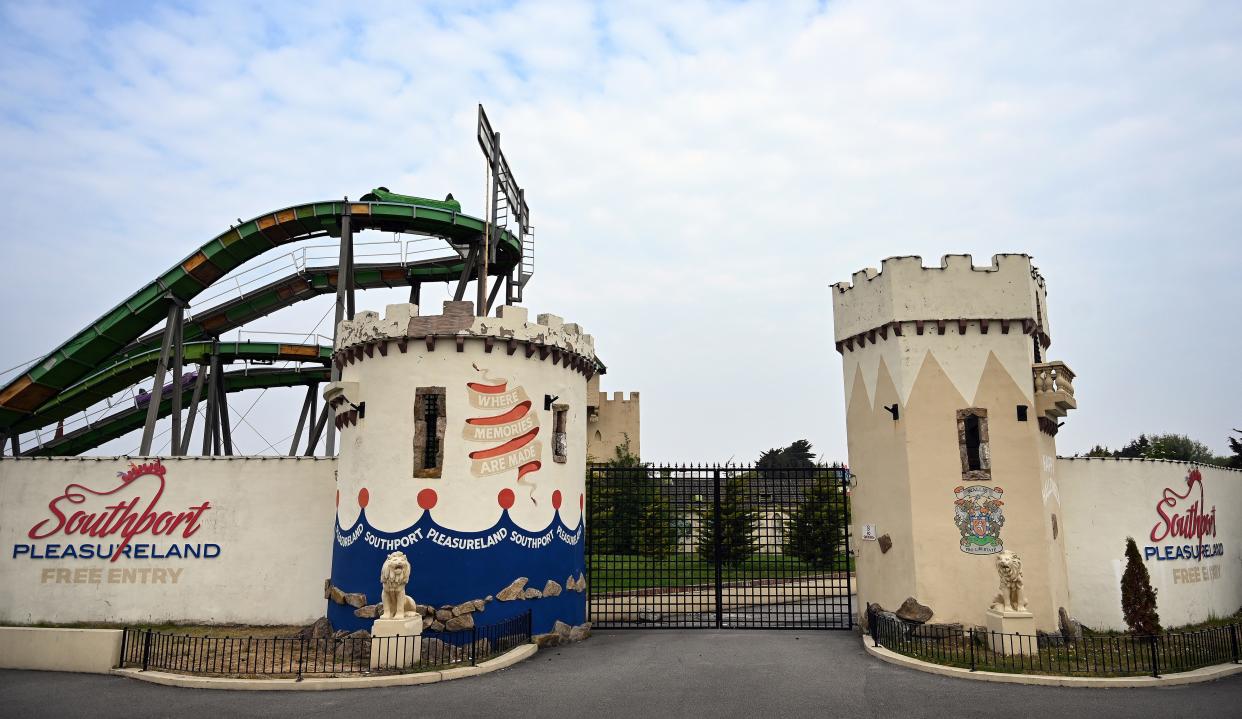 The closed gates of the Southport Pleasureland closed tourist attraction, are pictured in Southport, north west England, on April 26, 2020, as life in Britain continues during the nationwide lockdown to combat the novel coronavirus. - Britain's health ministry on Saturday April 25, said 813 more people had died after testing positive for COVID-19 in hospital, taking the death toll to 20,319. The figure is an increase on the 684 reported the previous day and comes after the government claimed the virus had hit its peak. (Photo by Paul ELLIS / AFP) (Photo by PAUL ELLIS/AFP via Getty Images)