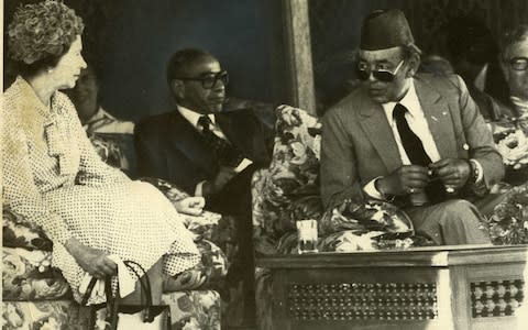 Queen Elizabeth II with King Hassan of Morocco in 1980 - Credit: AP