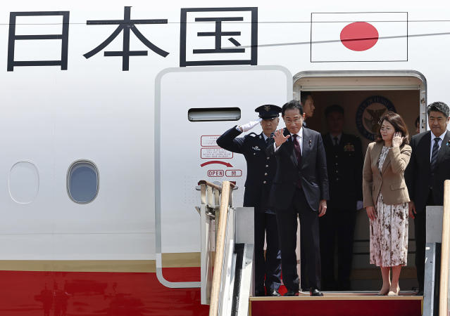 Japanese Prime Minister Fumio Kishida waves as he leaves the Seoul military airport in Seongnam, South Korea, Monday, May 8, 2023. (Yun Dong-jin/Yonhap via AP)