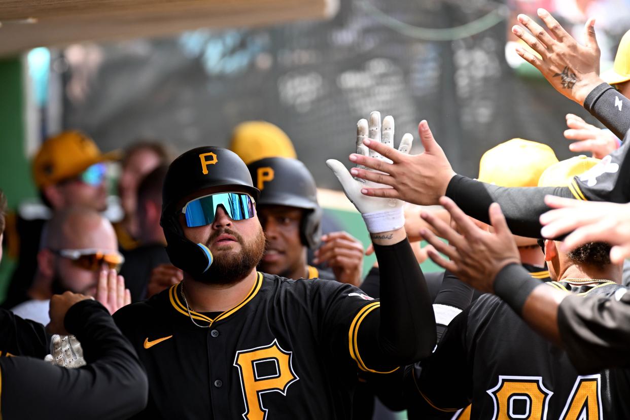 March 18: The Pittsburgh Pirates' Rowdy Tellez celebrates with teammates after hitting a three-run home run in the third inning against the Philadelphia Phillies at BayCare Ballpark.