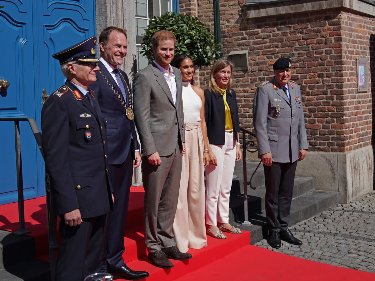 The Duke and Duchess of Sussex (centre) arrive at City Hall for the Invictus Games Dusseldorf 2023 One Year to Go event (Joe Giddens/PA) (PA Wire)