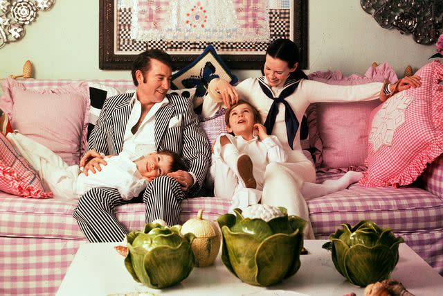 <p>Jack Robinson/Hulton Archive/Getty</p> Wyatt Cooper and Gloria Vanderbilt with sons Anderson and Carter in 1972