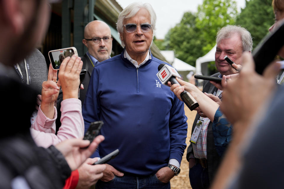 Trainer Bob Baffert speaks with reporters ahead of the 149th running of the Preakness Stakes horse race at Pimlico Race Course, Friday, May 17, 2024, in Baltimore. (AP Photo/Julia Nikhinson)