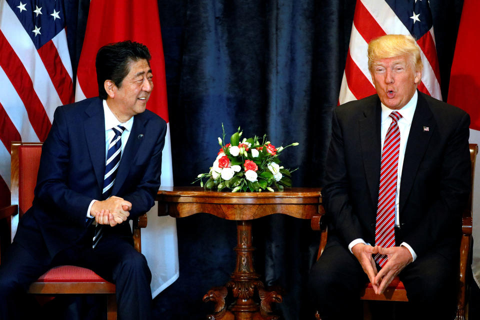 <p>U.S. President Donald Trump (R) speaks beside Japan’s Prime Minister Shinzo Abe during a bilateral meeting at the G7 summit in Taormina, Sicily, (Photo: Jonathan Ernst/Reuters) </p>