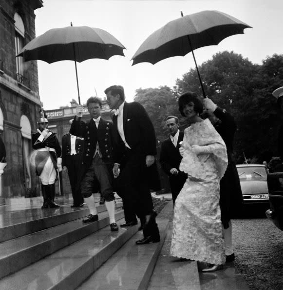 <p>During their European tour, President John F Kennedy and Jackie Kennedy arrive at Elysee Palace in Paris to meet the French President, Charles de Gaulle. </p>