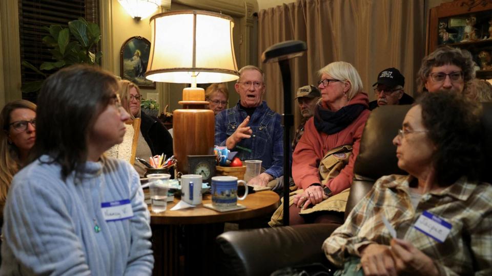 PHOTO: A man speaks as people participate in a caucus to choose a Republican presidential candidate, in Silver City, Iowa, Jan. 15, 2024. (Scott Morgan/Reuters)