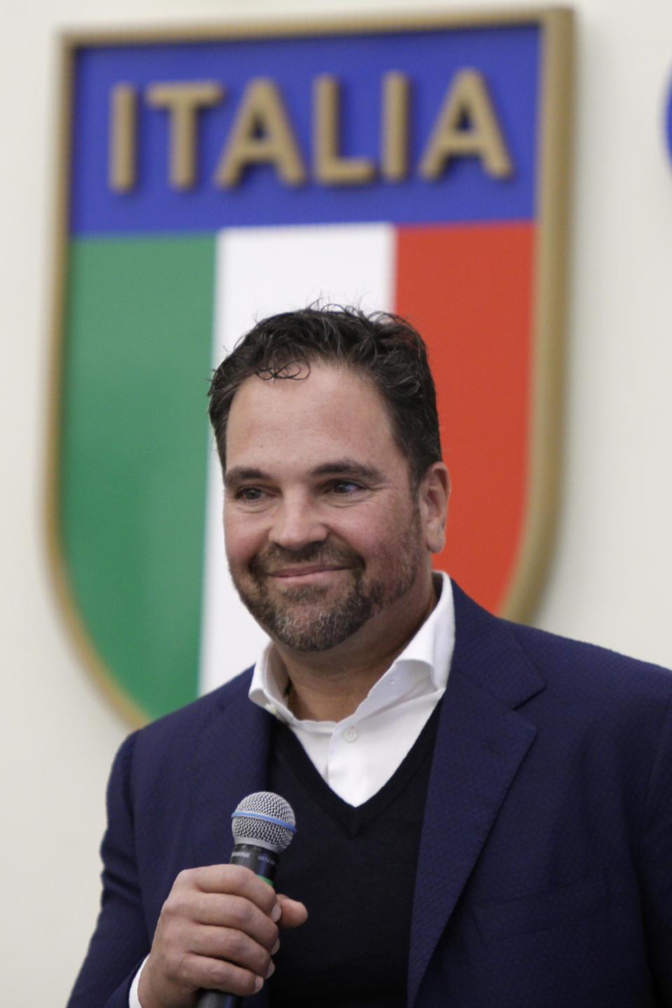 Hall of Fame catcher Mike Piazza speaks during his presentation as Italy's national baseball team coach, at the Italian Olympic Committee headquarters in Rome, Friday, Nov. 29, 2019. (AP Photo/Alberto Pellaschiar)