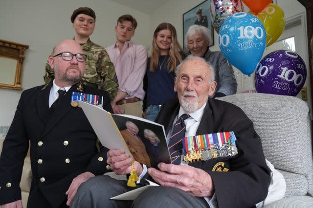 John Roberts with his birthday card from the and Queen