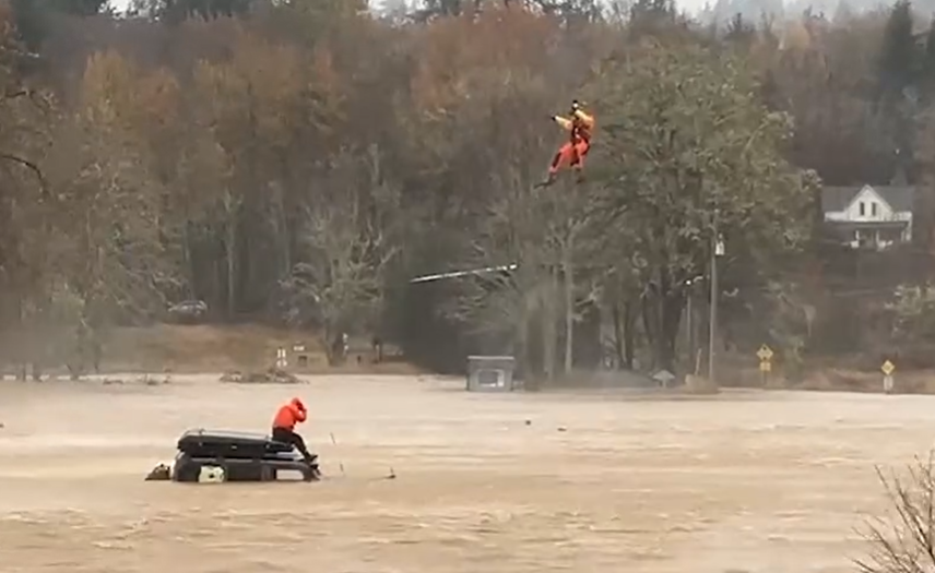 WATCH: Coast Guard rescues 5 from flooded home, submerged truck in Rosburg. Wash.
