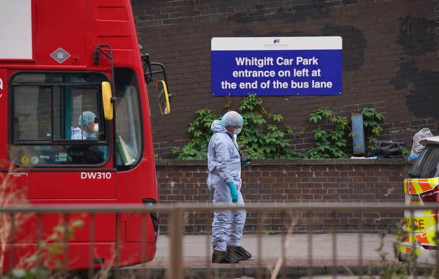 Forensic investigators at the scene near the Whitgift shopping centre 