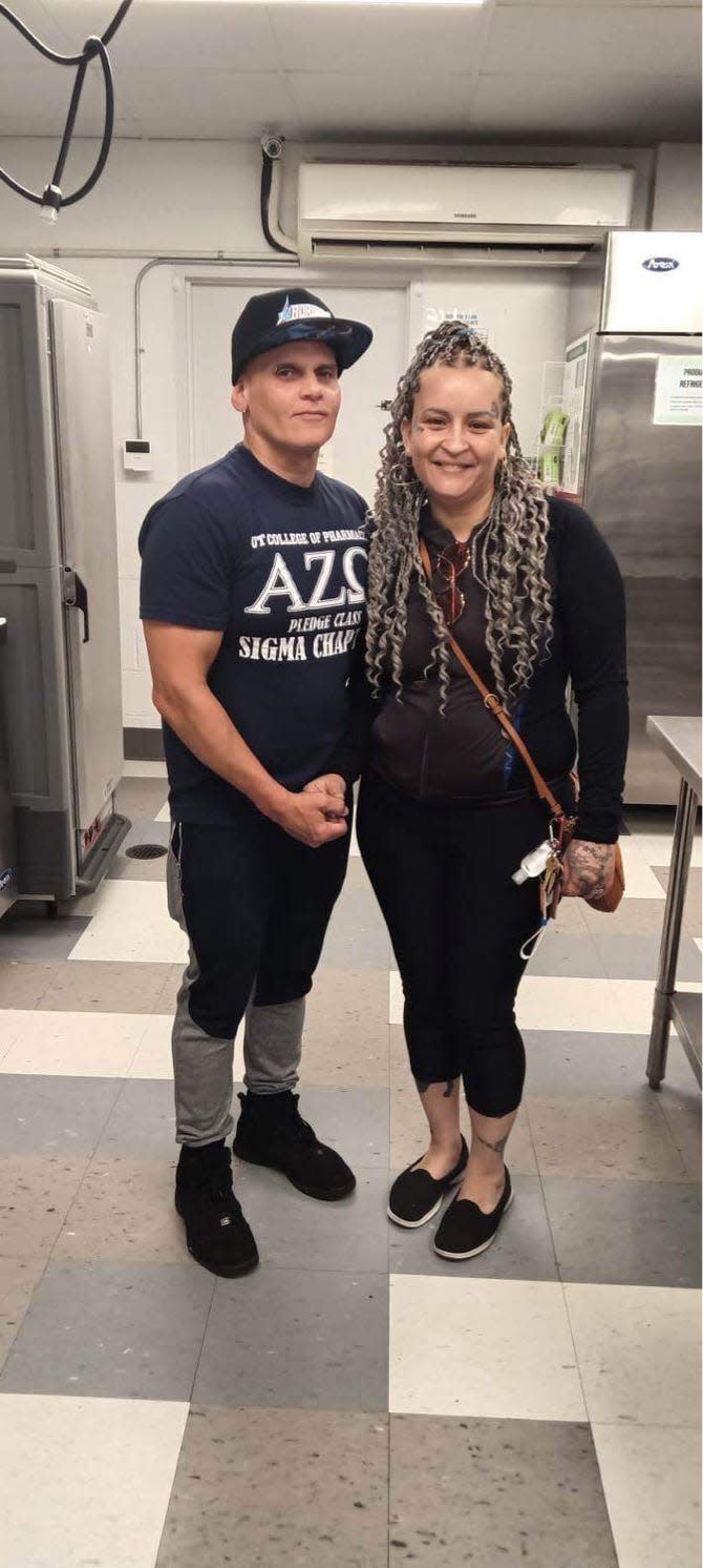 La Reina Boricua owners Julio and Monica Berrios, pictured in the Akron Food Works kitchen at The Well CDC, will do a takeover at Compass Cafe Thursday, where they'll sell their Puerto Rican foods.