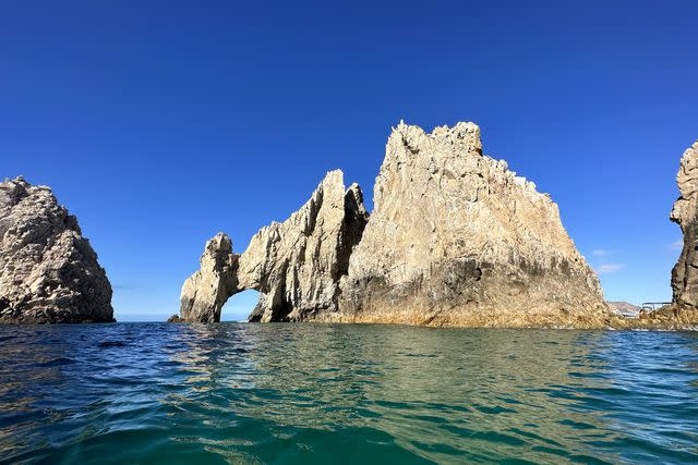 <p>Mariah Tyler/Travel + Leisure</p> View of the Cabo San Lucas arch seen from the kayak.