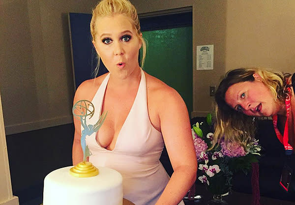 Amy Schumer eating cake with her hands is all of us