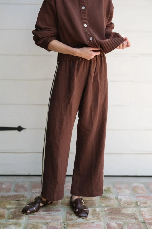 <em>Donni The Linen Crop Stripe Pant, $184 (sizes 2XS-2XL) </em><a href="https://rstyle.me/+PmpVlsAOjdJzPFCZNuZ6Wg" rel="nofollow noopener" target="_blank" data-ylk="slk:available here;elm:context_link;itc:0;sec:content-canvas" class="link ">available here</a><p>Photo: Courtesy of Donni</p>