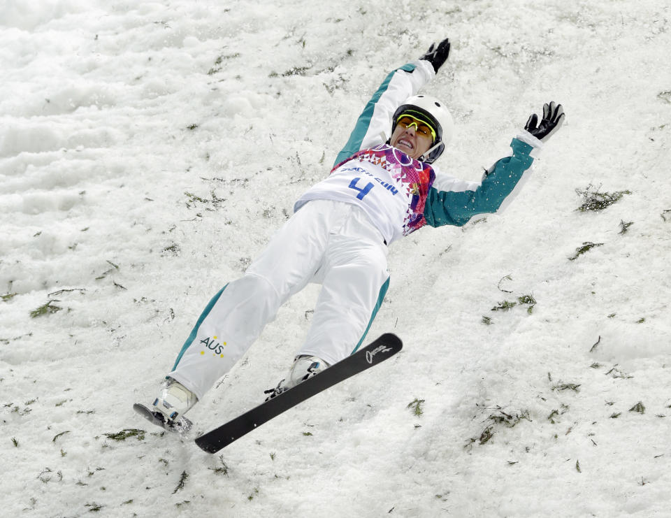 Australia's Lydia Lassila crashes on her final jump in the women's freestyle skiing aerials final at the Rosa Khutor Extreme Park, at the 2014 Winter Olympics, Friday, Feb. 14, 2014, in Krasnaya Polyana, Russia. (AP Photo/Andy Wong)