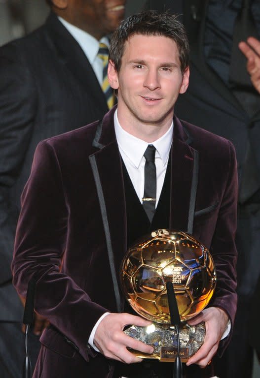 Lionel Messi poses after receiving, for the third time, the FIFA Ballon d'Or award in January. "My objective at the start of the season was to win another La Liga title," said Messi, who is in line to win a record fourth successive Ballon d'Or