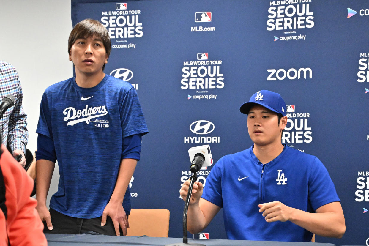 Ippei Mizuhara, left, agreed to plead guilty to a pair of charges after he stole nearly $17 million from Shohei Ohtani to help cover his gambling losses. (Jung Yeon-je/AFP/Getty Images)