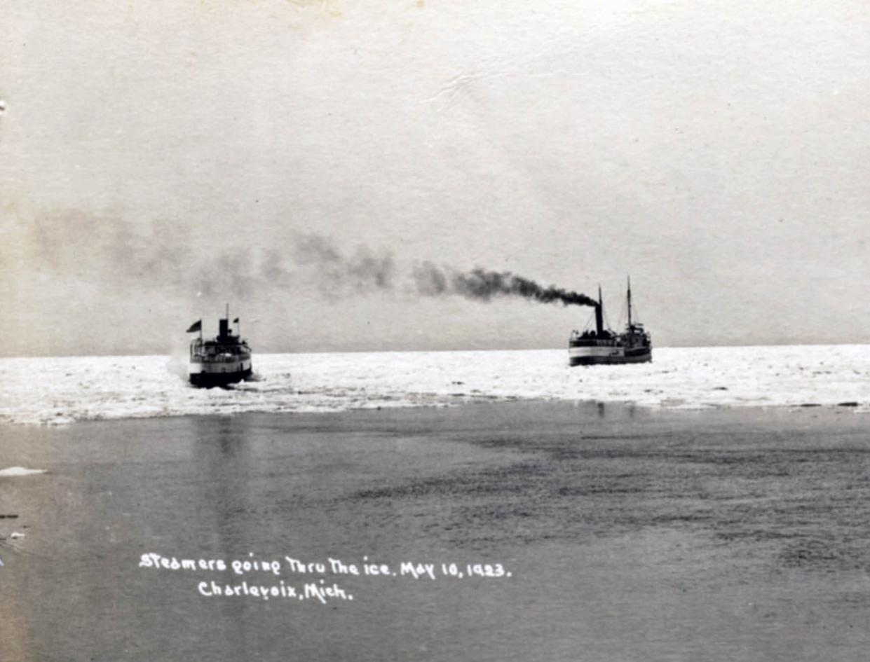 Passenger steamer, left, and lake freighter make it into Lake Michigan for the first time, May 10, 1923.