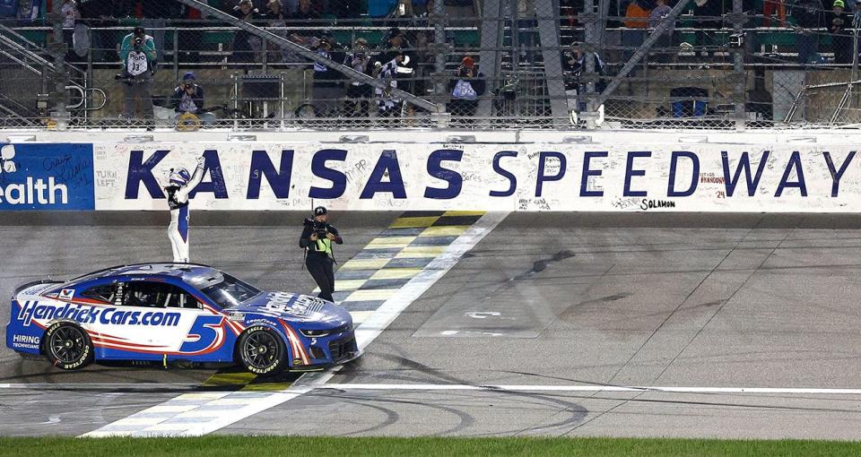 kyle larson celebrates at kansas