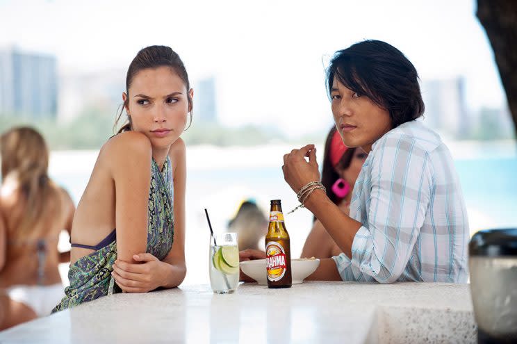 Gal Gadot and Sung Kang in 2011’s <em>Fast Five</em>. (Photo: Jaimie Trueblood/©Universal Pictures/courtesy Everett Collection)