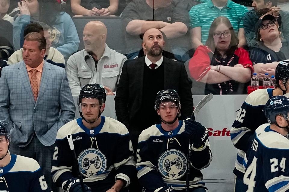 Apr 16, 2024; Columbus, Ohio, USA; Columbus Blue Jackets head coach Pascal Vincent watches from the bench during the second period of the NHL hockey game against the Carolina Hurricanes at Nationwide Arena.
