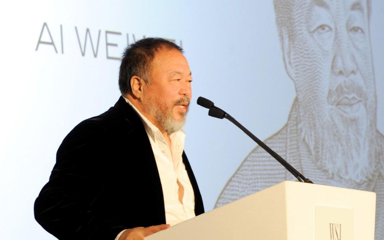 Artist Ai Weiwei accepts an award onstage at the WSJ Magazine 2016 Innovator Awards at Museum of Modern Art on November 2, 2016 in New York City. (Photo by Rabbani and Solimene Photography/Getty Images for WSJ. Magazine Innovators Awards) Image title: 620811972 - Rabbani and Solimene/Getty