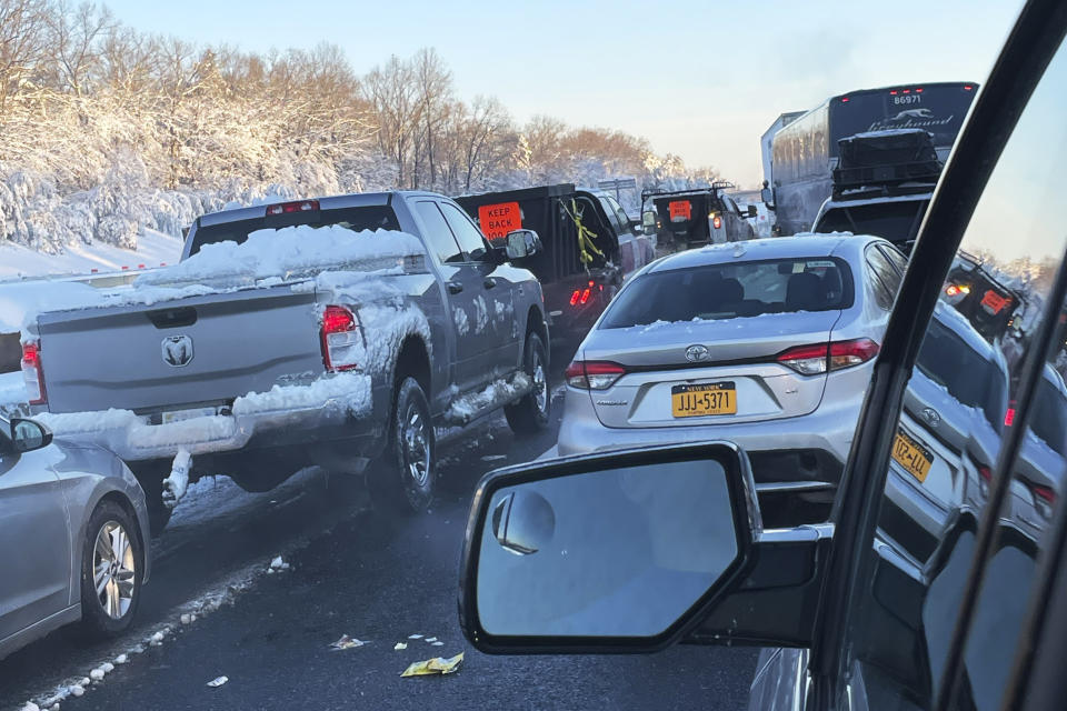 This photo provided by Jennifer Travis shows the view from her car where she her husband and 12-year-old daughter were among hundreds of motorists who waited desperately for help.