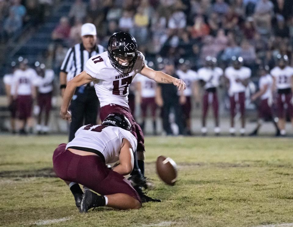 Taylor Gardner (17) attempts a field goal during the Navarre vs Gulf Breeze football game at Gulf Breeze High School on Friday, Oct. 28, 2022.