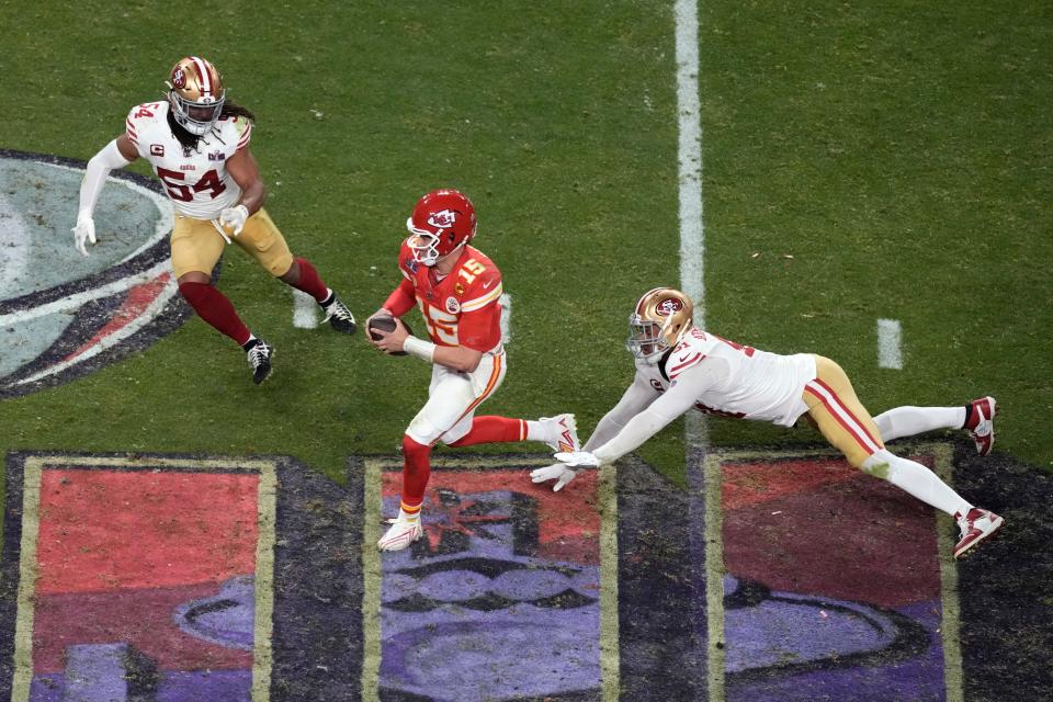 Chiefs quarterback Patrick Mahomes runs against the 49ers during overtime of the Chiefs' 25-22 overtime win in Super Bowl 58 on Sunday, Feb. 11, 2024, in Las Vegas.