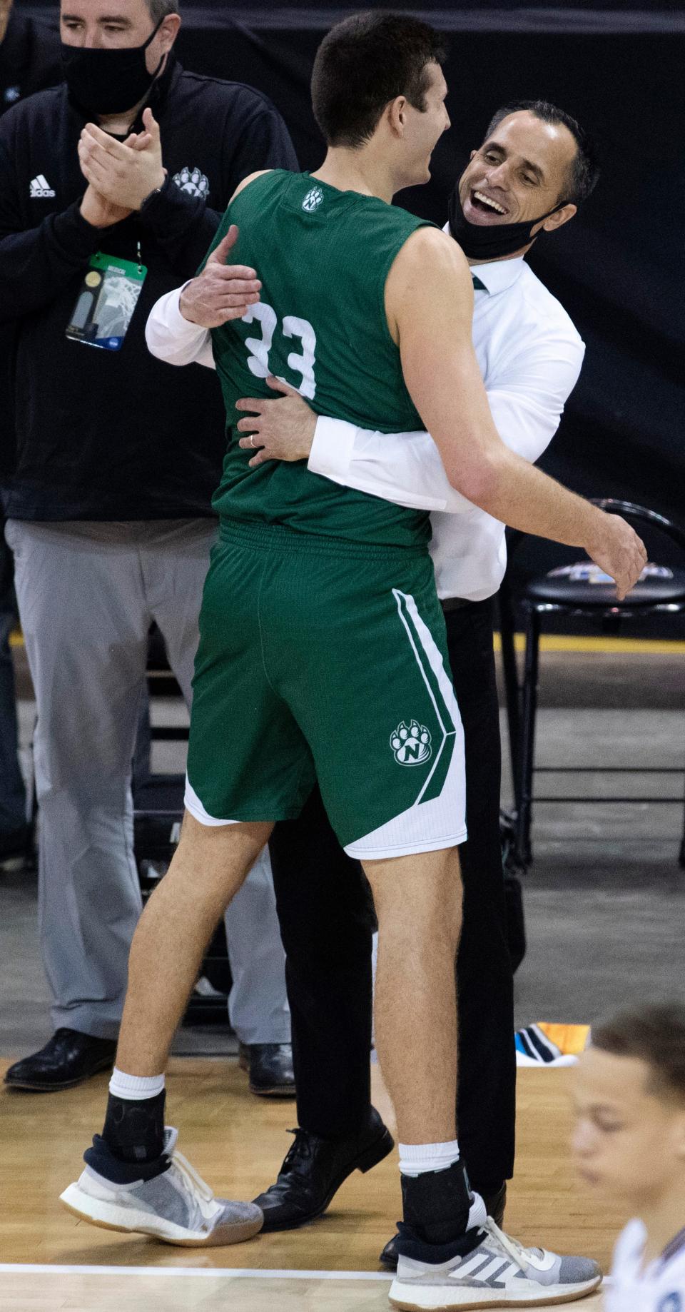Northwest Missouri's Ryan Hawkins (33) and Northwest Missouri Head Coach Ben McCollum celebrate. Hawkins transferred to Creighton for the 2021-22 season and helped the Bluejays to the second round of the NCAA Tournament.