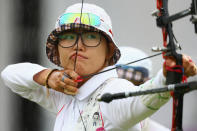 LONDON, ENGLAND - JULY 29: Hyeonju Cho of Korea competes in the Women's Team Archery Gold medal match between Korea and China on Day 2 of the London 2012 Olympic Games at Lord's Cricket Ground on July 29, 2012 in London, England. (Photo by Paul Gilham/Getty Images)