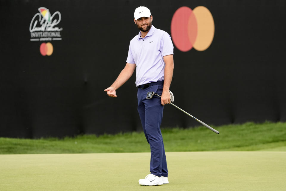 Scottie Scheffler reacts after missing a putt on the 14th green during the final round of the Arnold Palmer Invitational golf tournament Sunday, March 10, 2024, in Orlando, Fla. (AP Photo/John Raoux)