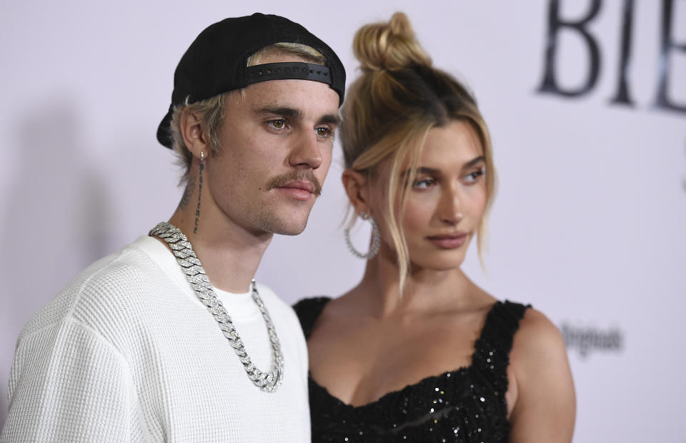 Justin Bieber and Hailey Baldwin arrive at the Los Angeles premiere of "Justin Bieber: Seasons," Monday, Jan. 27, 2020. (Photo by Jordan Strauss/Invision/AP)