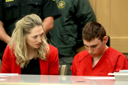 Nikolas Cruz, facing 17 charges of premeditated murder in the mass shooting at Marjory Stoneman Douglas High School in Parkland, appears in court for a status hearing before Broward Circuit Judge Elizabeth Scherer in Fort Lauderdale, Florida, U.S. February 19, 2018. REUTERS/Mike Stocker/Pool