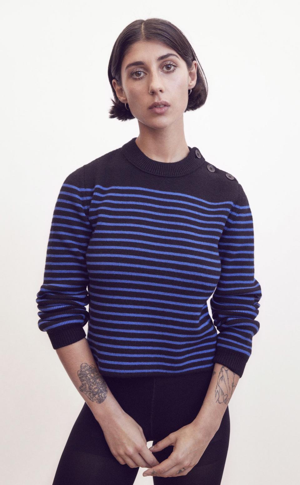 Helin Honung in a striped recycled- and organic-wool sweater.