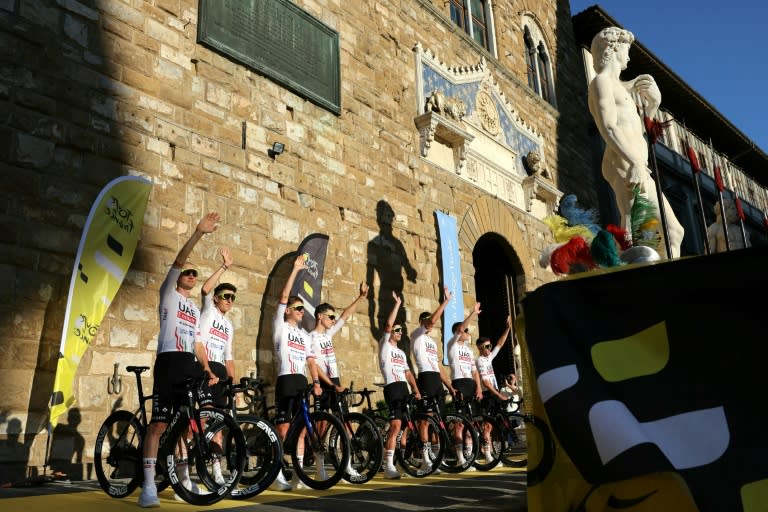 UAE Team Emirates riders wave to crowds at the Palazzo Vecchio (Thomas SAMSON)