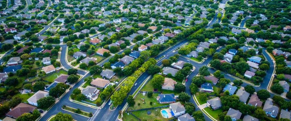 Thousands of houses aerial birds eye view suburb housing development new neighborhood in Austin , Texas , USA modern architecture and design