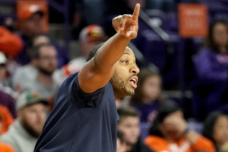 Radford head coach Darris Nichols speaks during the first half of an NCAA college basketball game against Clemson, Friday, Dec. 29, 2023, in Clemson. (AP Photo/Mike Stewart)