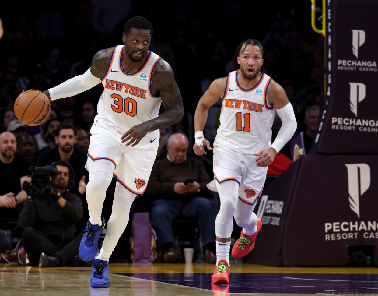 LOS ANGELES, CALIFORNIA - DECEMBER 18: Julius Randle #30 of the New York Knicks brings the ball up court with Jalen Brunson #11 during a 114-109 win over the Los Angeles Lakers at Crypto.com Arena on December 18, 2023 in Los Angeles, California. NOTE TO USER: User expressly acknowledges and agrees that, by downloading and or using this photograph, User is consenting to the terms and conditions of the Getty Images License Agreement. (Photo by Harry How/Getty Images)
