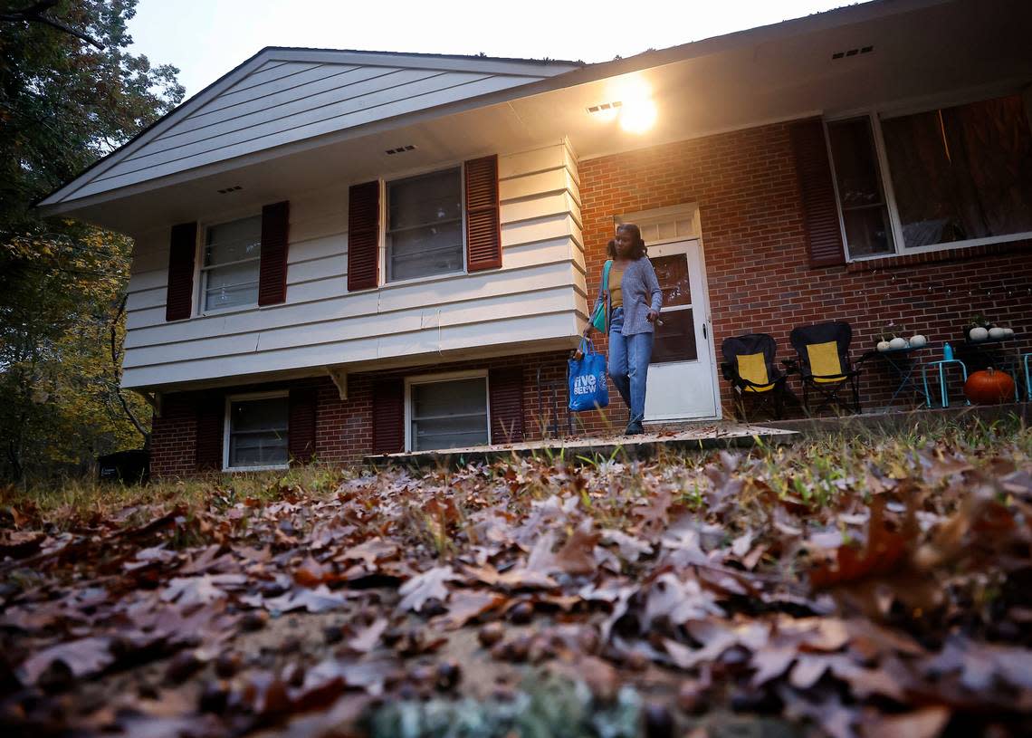 Sheba Everett leaves her Durham, N.C. home to take her youngest daughters to school before going to work on Wednesday, Nov. 2, 2022.