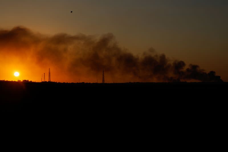 Smoke rises over Gaza, as seen from Israel