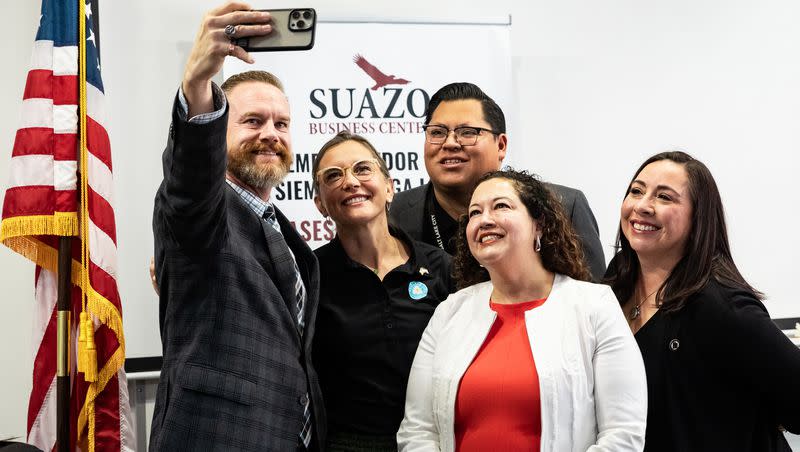 A group including Salt Lake City Mayor Erin Mendenhall and representives of the city and Salt Lake’s hispanic community take a selfie during an event gathering community members and community leaders to celebrate the start of Hispanic Heritage Month at the Suazo Business Center in Salt Lake City on Friday, Sept. 15, 2023.