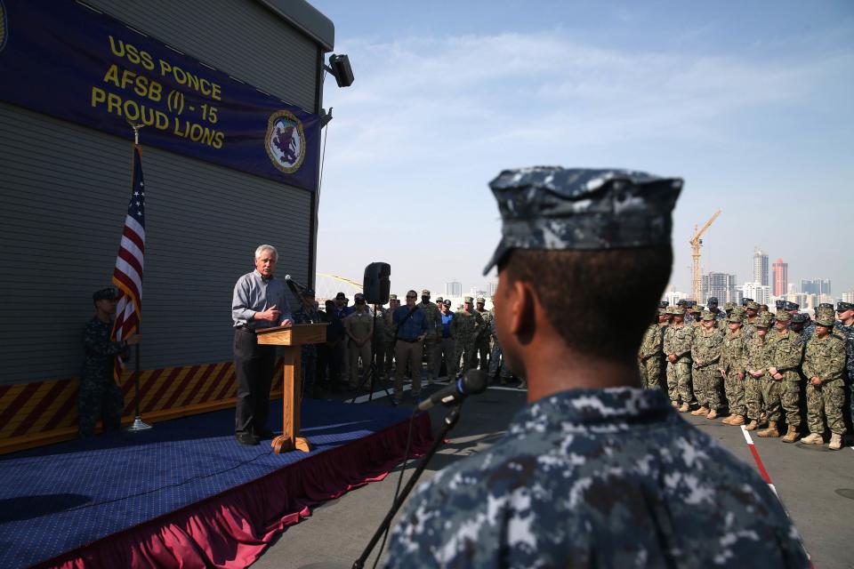 U.S. Secretary of Defense Chuck Hagel addresses military servicemembers aboard the USS Ponce, in Manama