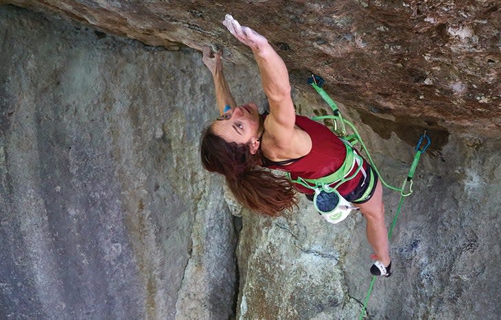 Rock climber Melissa Leneve on Action Directe in the Frankenjura.