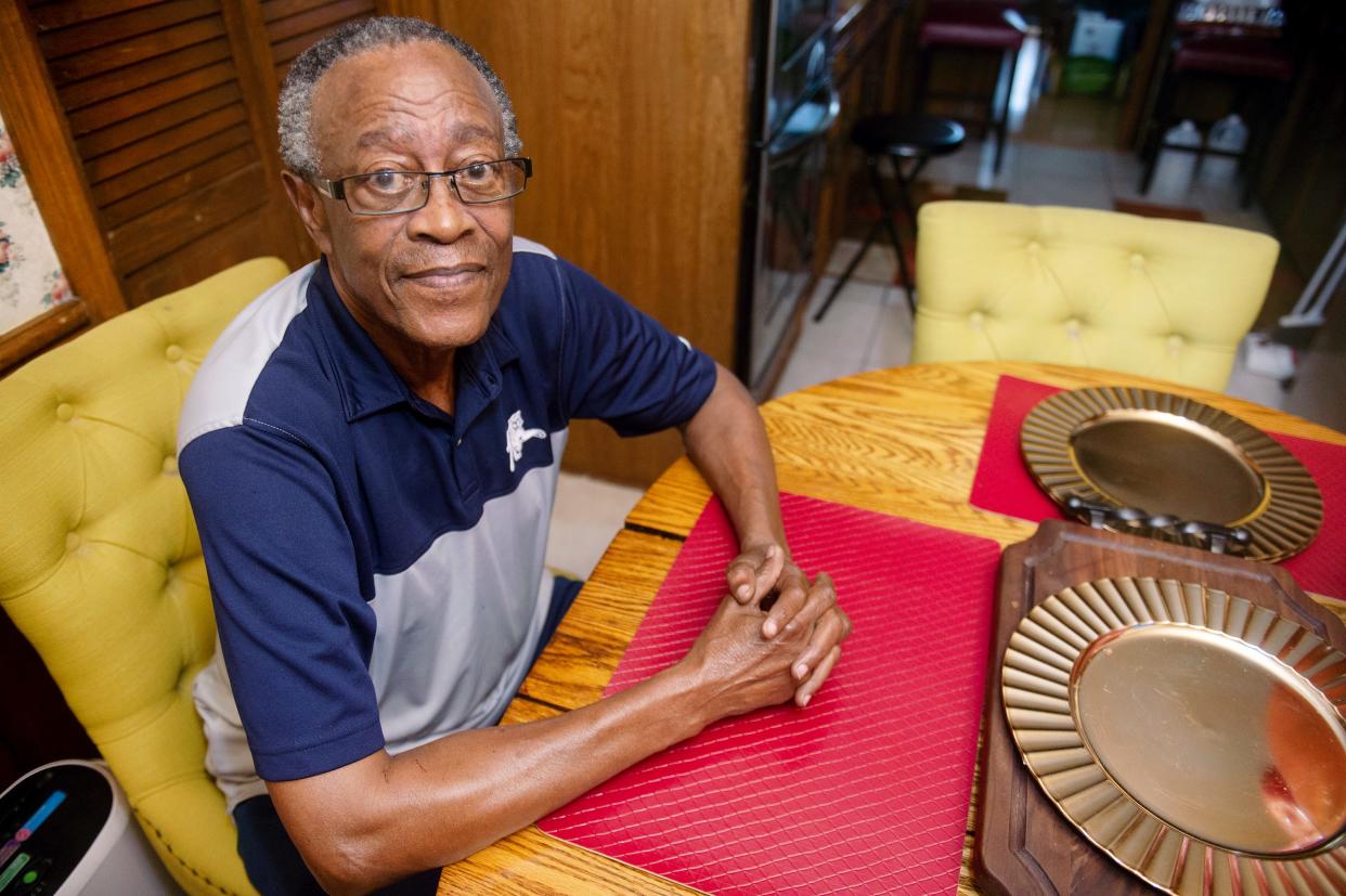 Fred Douglas Moore Clark, a former Freedom Rider, poses for a portrait inside of his home in Jackson, Miss., on July 9, 2021.