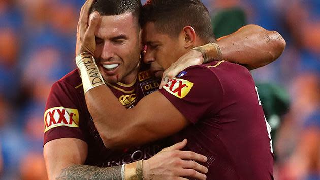 Darius Boyd and Dane Gagai celebrate the Newcastle winger's try.