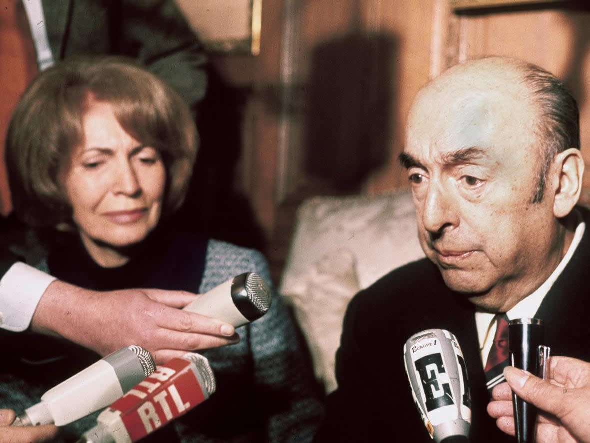 Chilean writer, poet and diplomat Pablo Neruda, right, is shown next to his wife Matilde Urrutia at the Chilean embassy in Paris after being awarded the 1971 Nobel Prize in Literature. (STF/AFP/Getty Images - image credit)