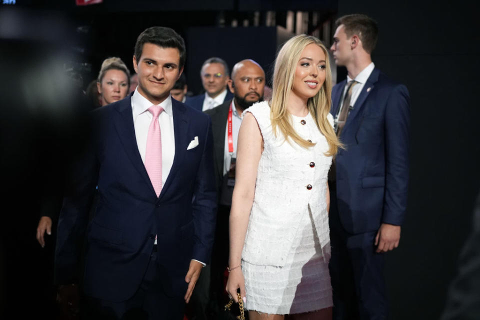 Tiffany Trump walks with her husband Michael Boulos on the second day of the 2024 Republican National Convention at the Fiserv Forum.<span class="copyright">Andrew Harnik—Getty Images</span>